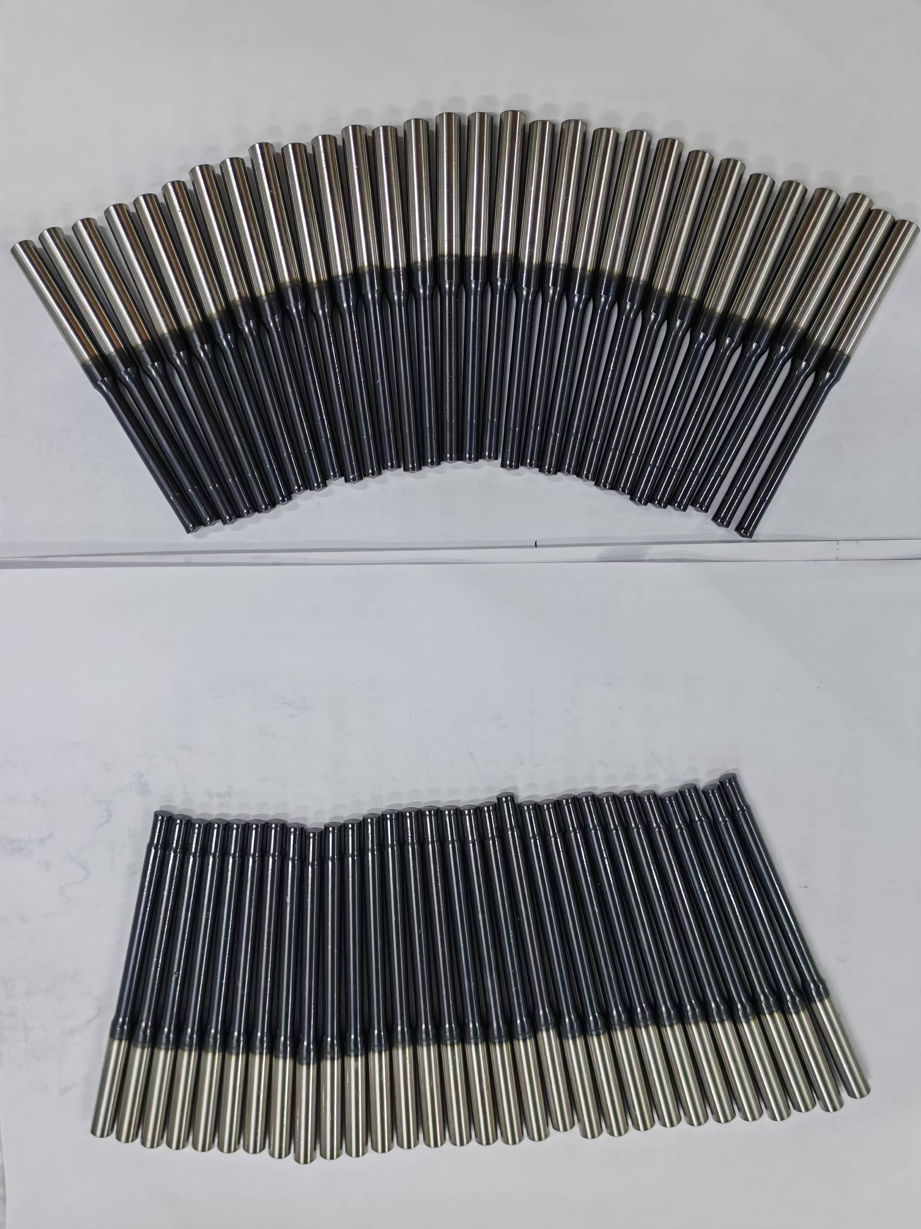 Precision pin mold components showing high-quality titanium plating